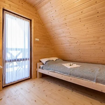 Osada Pod Dinozaurami Domki Leba/ Holiday home Nowecin