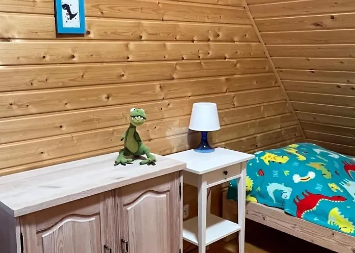 Dom wakacyjny Osada Pod Dinozaurami Leba/ Nowecin